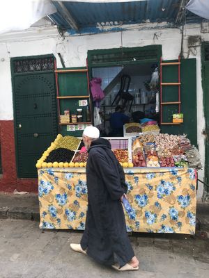 Front door and olive seller