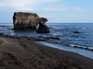 Rock arch off the shore of Santiago