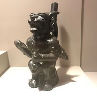 Decapitator god with severed head